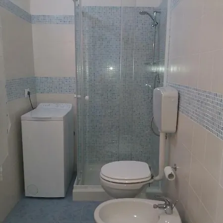 Attico Con Terrazza 아파트 포쟐로